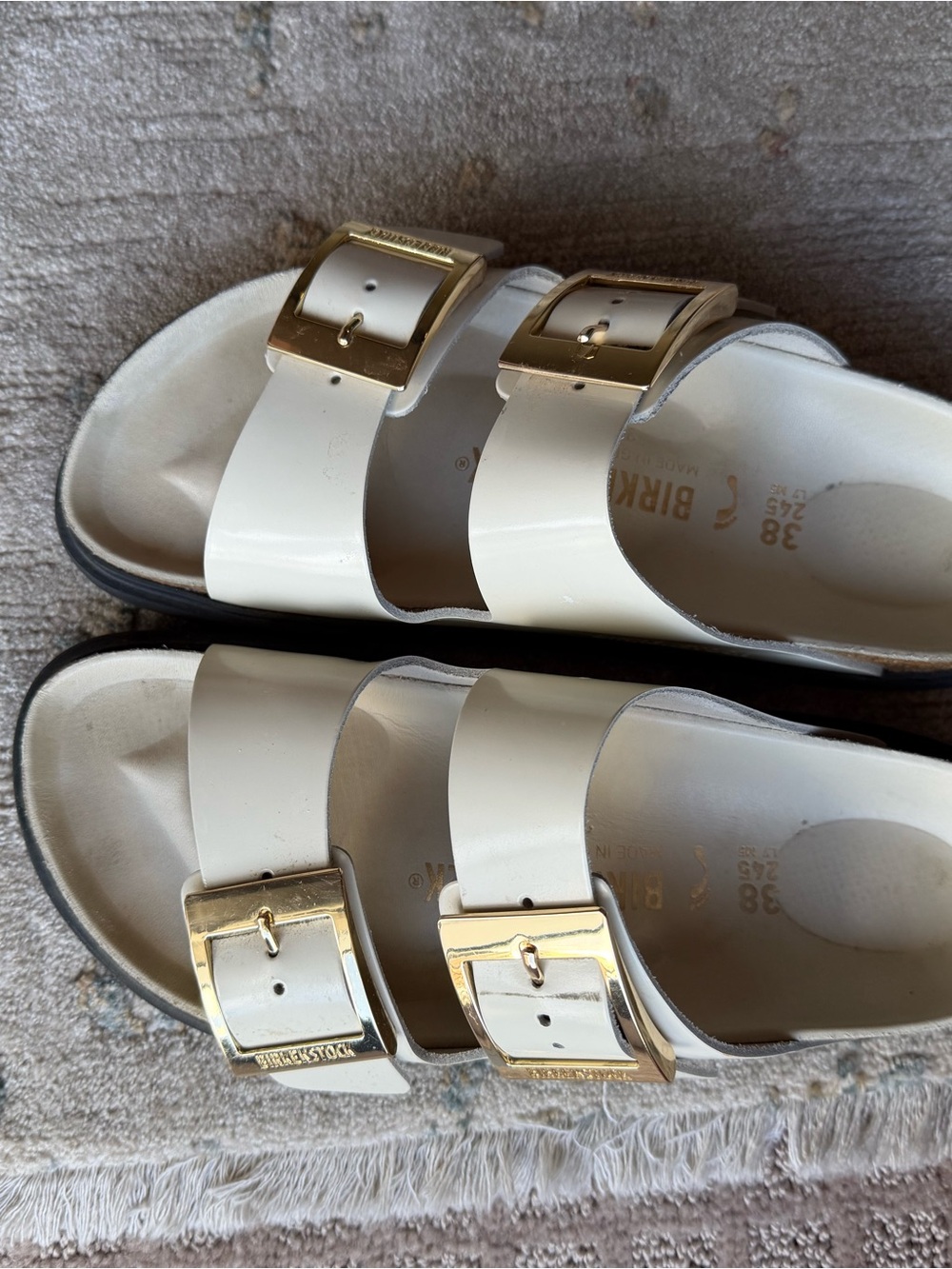 Birkenstock White Double Strap Sandals with Gold Buckles
